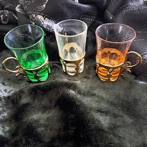 3 adorable shot glasses with holders